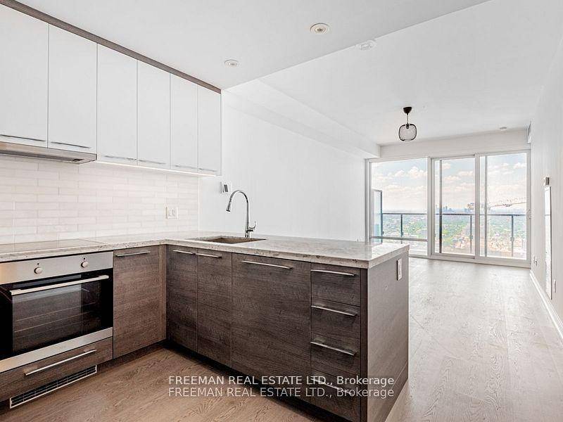 Discover this modern 1 Den condo at 488 University Ave, where the spacious den can easily function as a 2nd bedroom or home office.