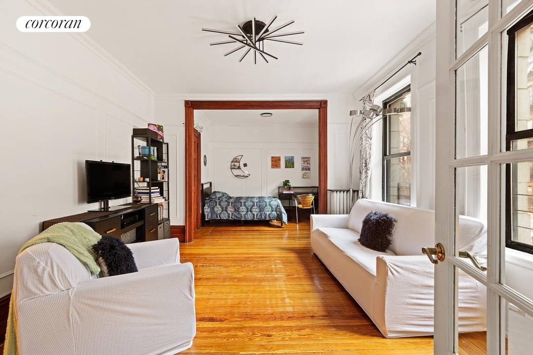 Welcome to 509 West 122nd Street, Apartment 7, a charming pre war co op nestled within a classic low rise elevator building on a picturesque tree lined block.