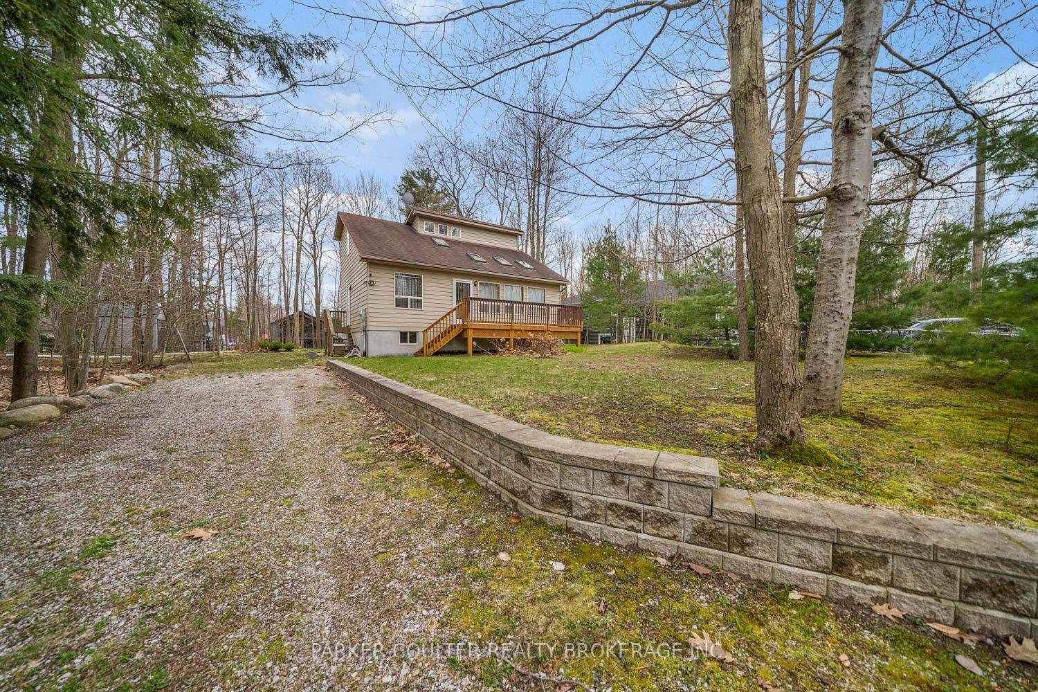 Welcome to 138 Tall Pines Drive, a charming 2 storey home nestled on a private, well treed lot just moments from the beaches of Georgian Bay.