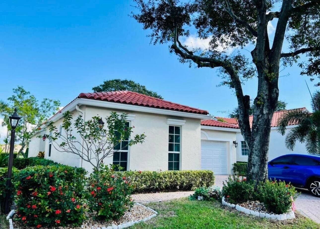 Welcome to this beautifully maintained 3 bedroom, 2 bathroom single family home located on the golf course in the desirable Boca Country Club.