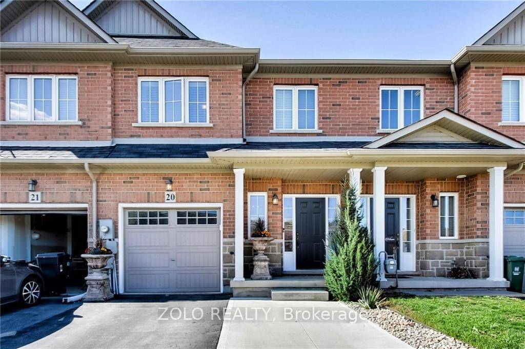 Welcome to 170 Palace beach Trail an airy 2 storey, 3 bedroom townhome with generous living space in the highly sought after lakefront community of Fifty Point.