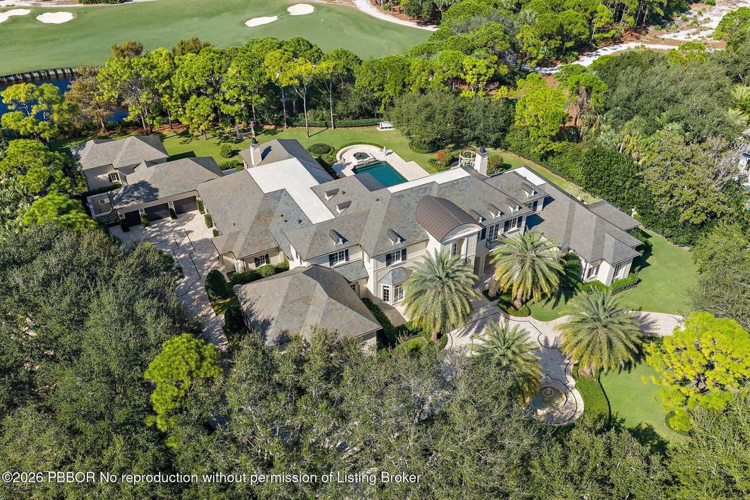 This timeless European Estate Home sits on 1.