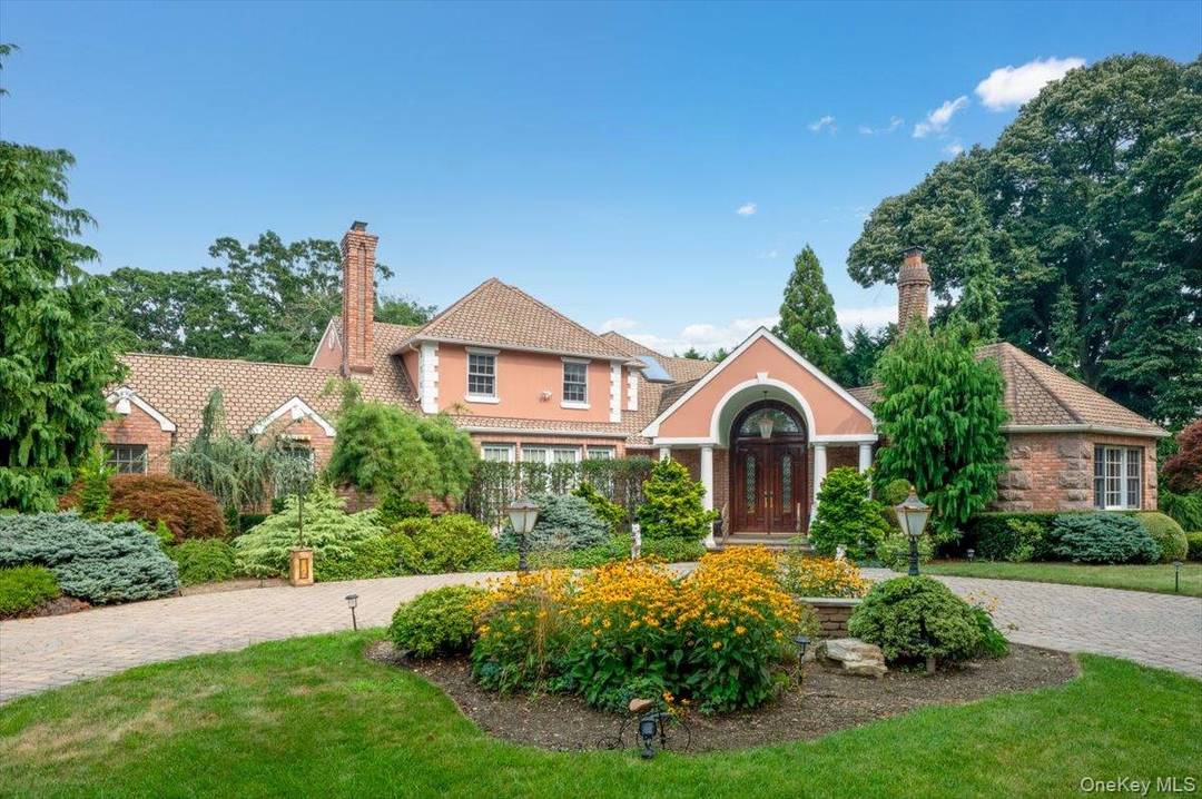 Experience refined living at 1331 Harbor Road, an exceptional residence in the prestigious Hewlett Harbor community.