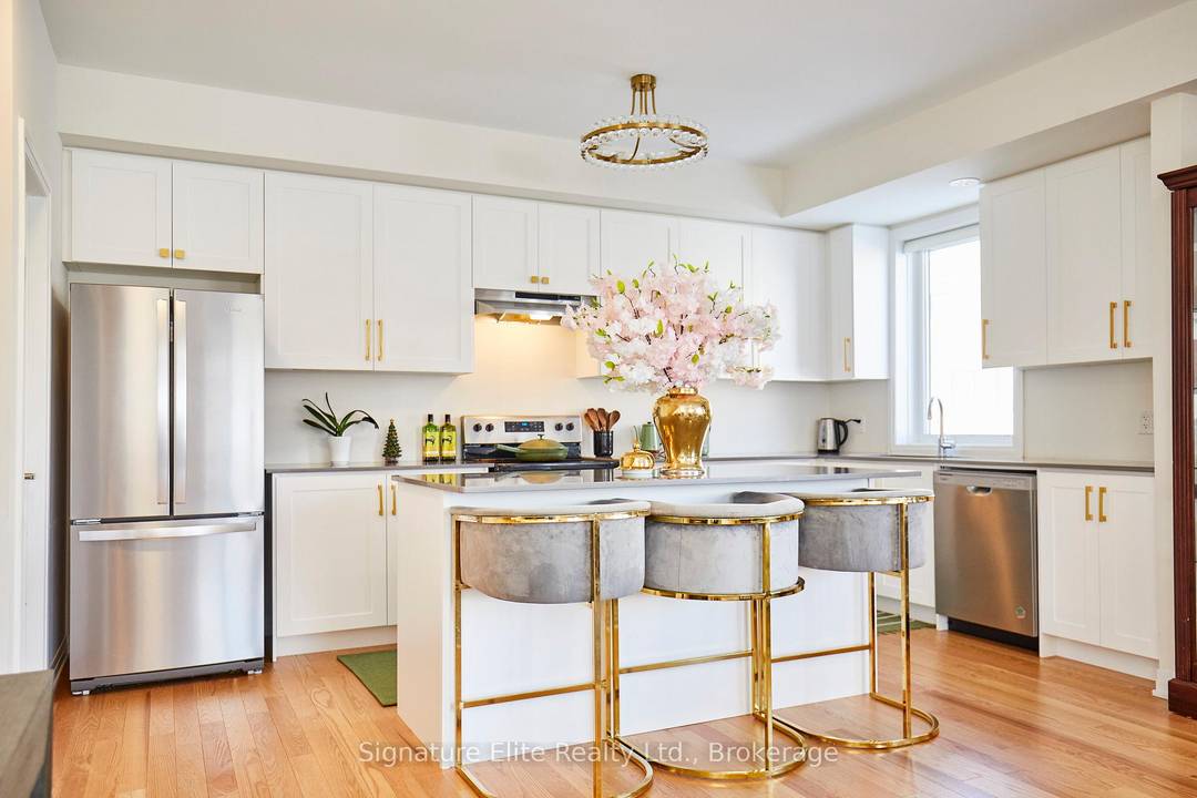 Welcome To 70 Baynes Way, An Exceptional End Unit Townhome In The Highly Sought After Cachet Bradford Towns Community.