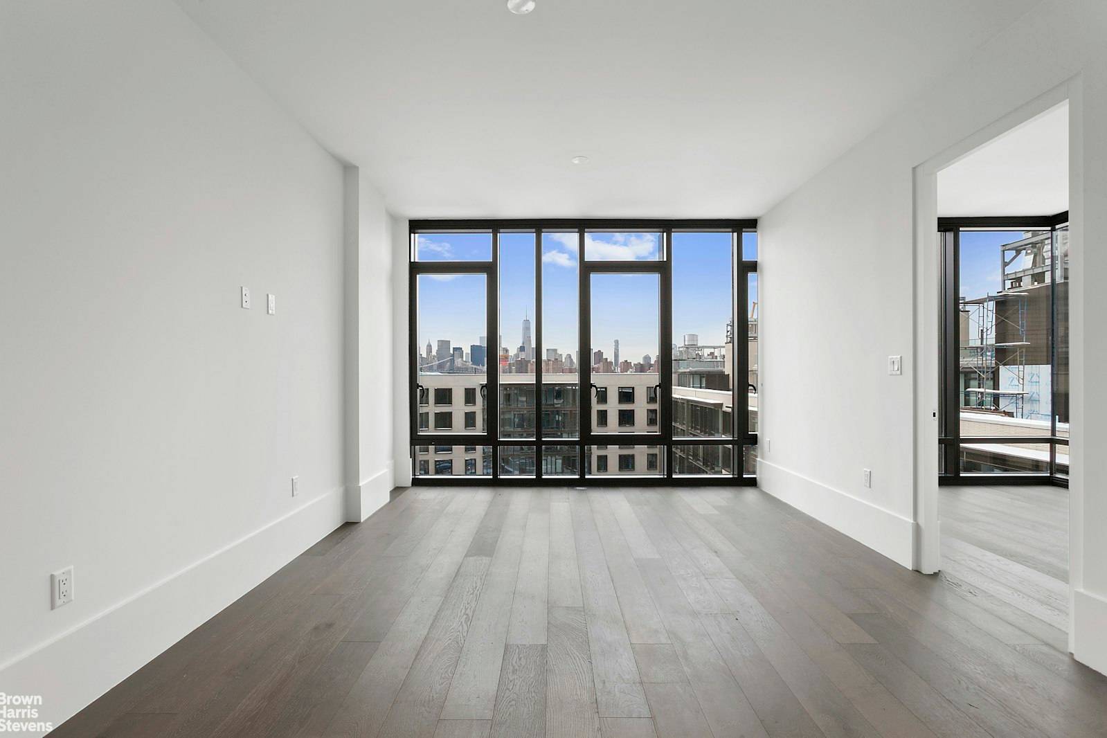 A bright and stunning top floor one bedroom unit overlooking a spectacular landscaped courtyard at The Oosten, South Williamsburg's premiere residential development on the waterfront.