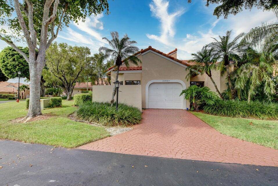 Welcome to 22667 Meridiana Dr, a charming 3 bedroom, 2 bath villa in the coveted Boca Pointe community.