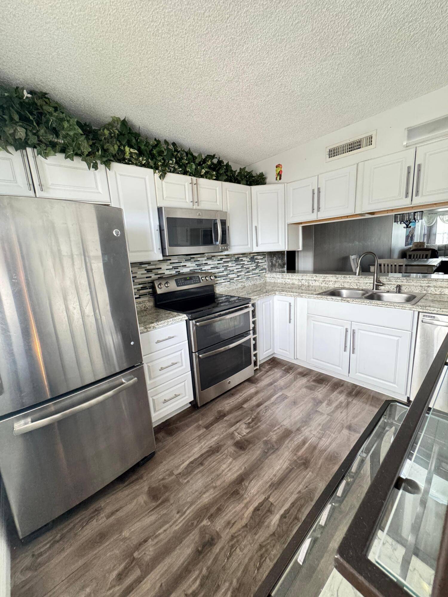 Check out this nearly new 2 bedroom, 2 bathroom condo on the third floor, featuring beautiful tile and vinyl flooring throughout.