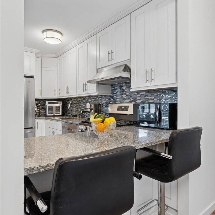Renovated and spacious, 2BR home offers high ceilings, natural light, and unobstructed views of Marcus Garvey Park.
