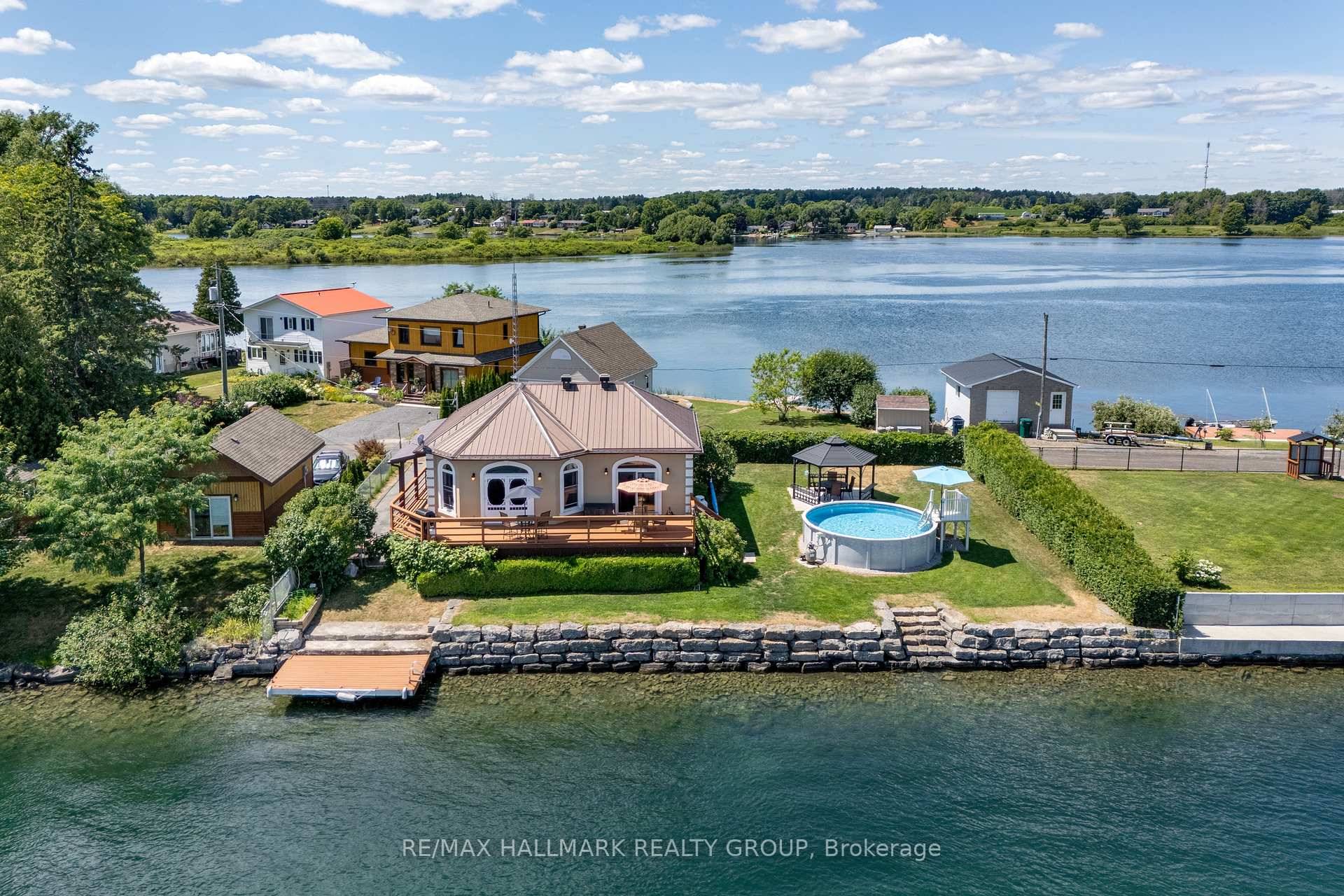 Welcome to 33 Tuttle Point Road a stunning waterfront bungalow that offers the ultimate St.