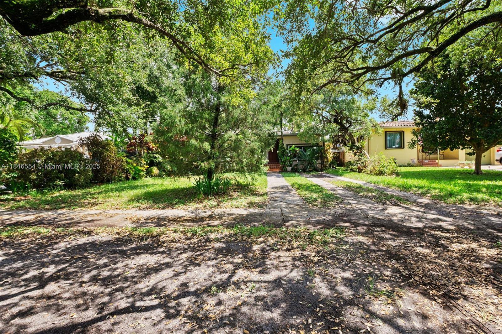 Welcome to your perfect starter home nestled on a serene, oak lined street !