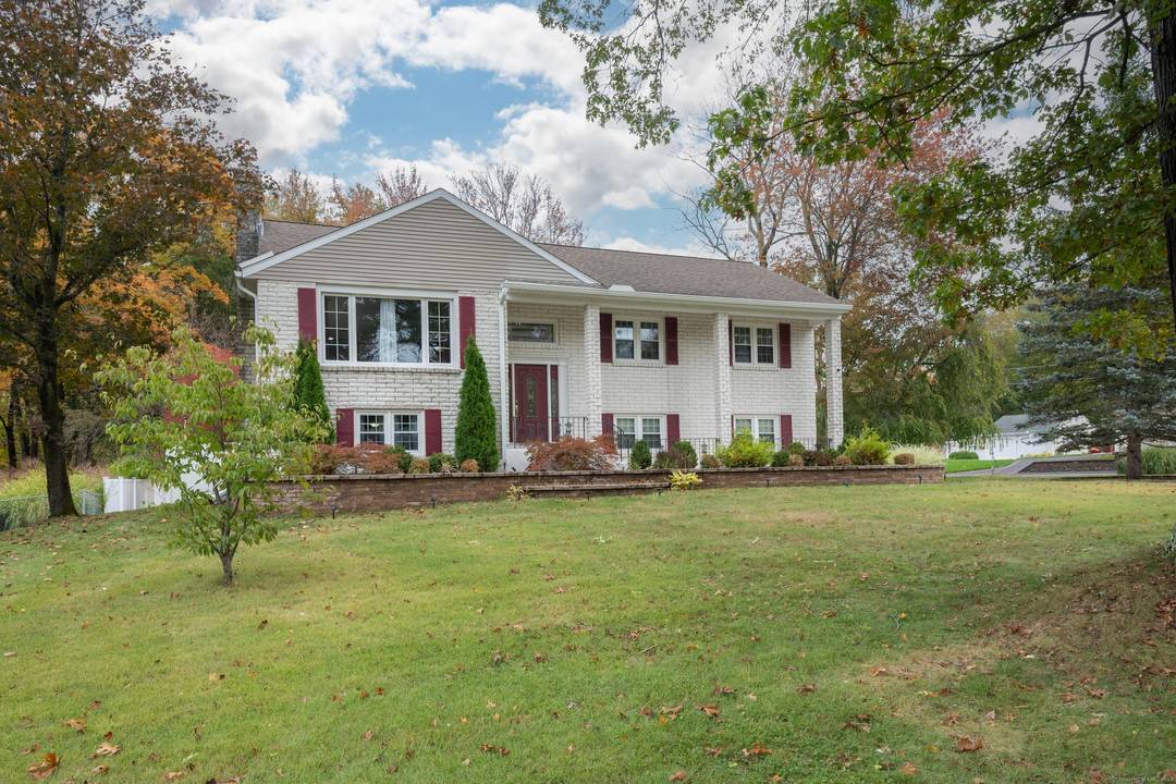 Spacious well maintained raised ranch on well manicured level corner lot waiting for its new owner to enjoy.