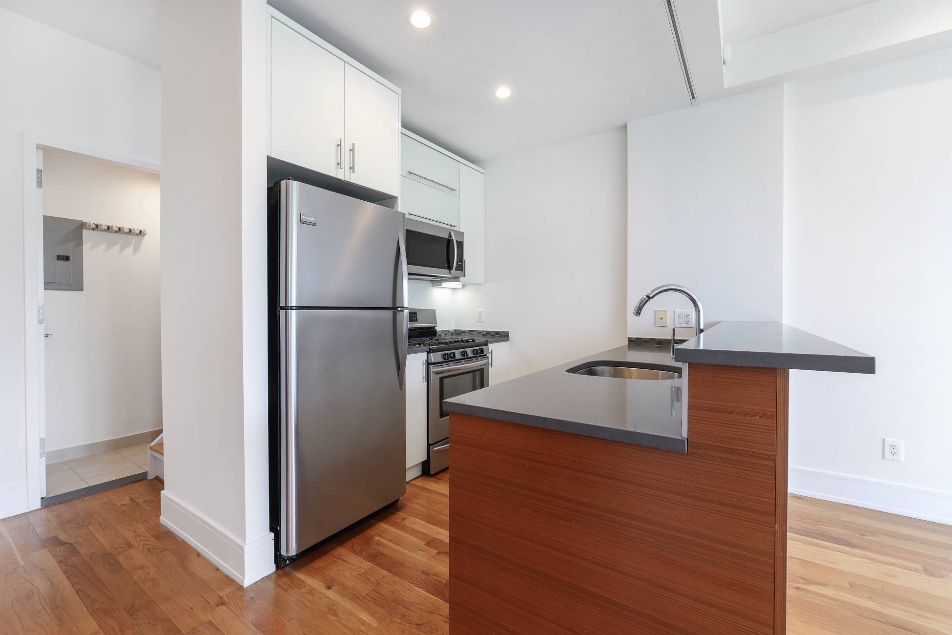 This 2 bedroom, 2 bathroom duplex sits on the corner of the top floor ; A 3 floor walkup.