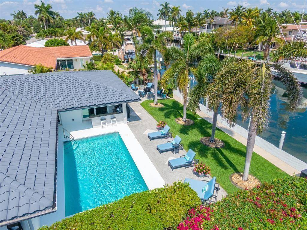 AVAILABLE FEB. 2026 ! FULLY FURNISHED TURN KEY RESORT STYLE BEACH HOUSE w 80 of deep water in sought after HARBOR VILLAGE !