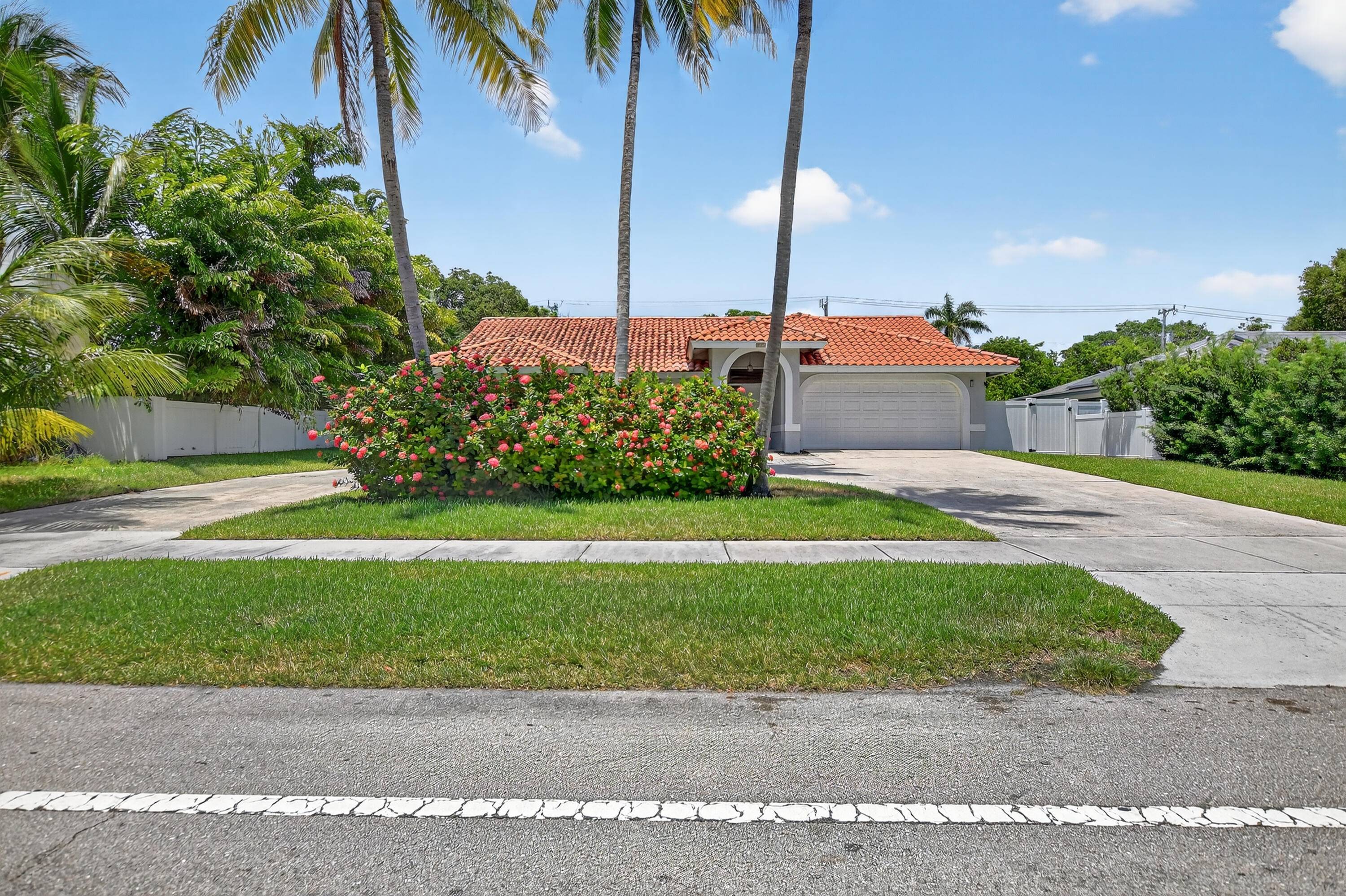 This beautifully renovated home is perfectly situated in East Boca Raton, offering both luxury and convenience.