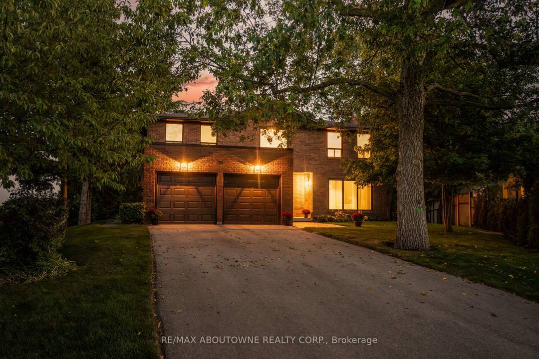 Unobstructed Lake Ontario views define this rare opportunity in South East Oakville's prestigious Arkendo enclave.