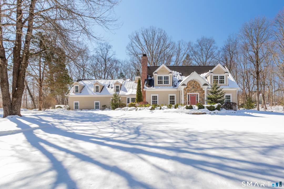Beautifully rebuilt 4, 058 SF Storybook Colonial Cape set on 3, level acres along a peaceful Easton road.