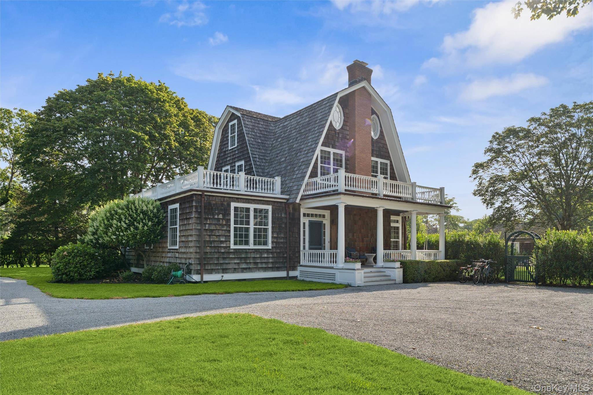 QUOGUE SOUTH ESTATE RENTAL Centrally located in the heart of Quogue's estate section, this elegant residence has just undergone a complete high end renovation.