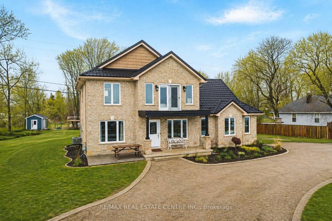 Welcome to 2801 North Shore Drive, Lowbanks a stunning custom built, year round cottage offering the perfect blend of comfort, privacy, and lakeside living.