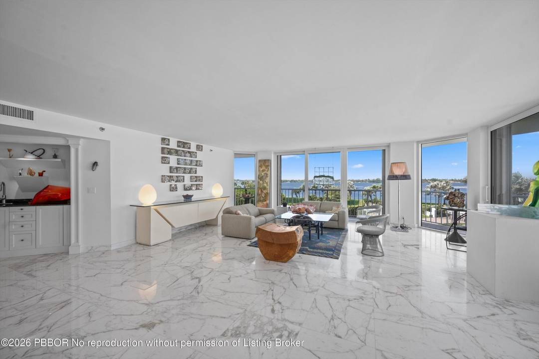 Highly desirable, light filled NW corner residence featuring an open concept layout with floor to ceiling impact windows and sliding glass doors that showcase sweeping ocean and Intracoastal views.