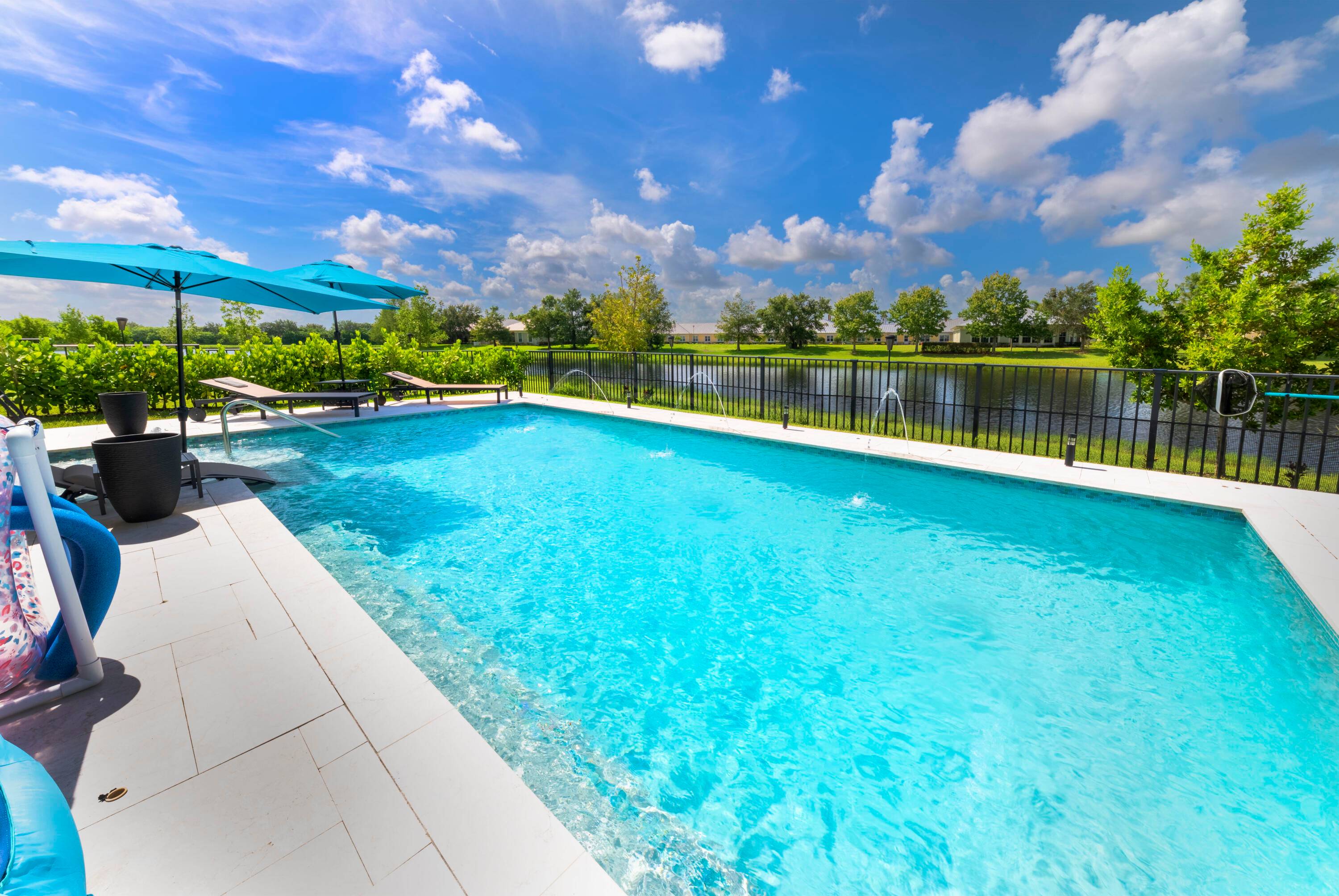 STUNNINGLY BEAUTIFUL NEWLY BUILT 2023 LAKEFRONT HOME WITH NEW SALTWATER POOL SPA.