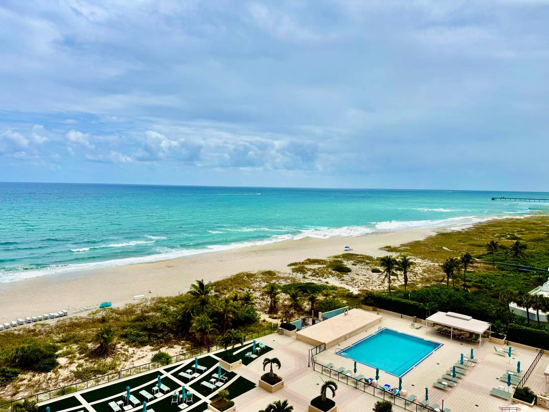 Perched high above the shoreline in the prestigious Whitehall, this stunning 2 bedroom, 2 bath oceanfront residence offers sweeping, unobstructed views of the Atlantic from every room.