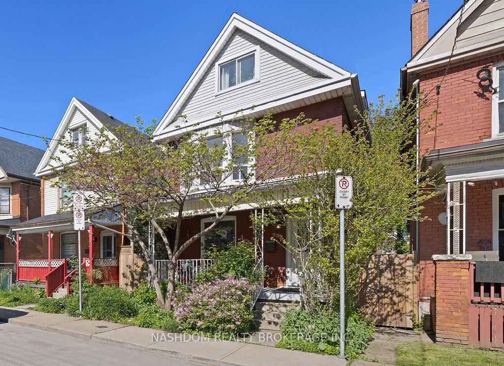 Spacious 1, 676 sq ft brick home with 5 bedrooms, 2 bathrooms, and a functional layout full of potential.