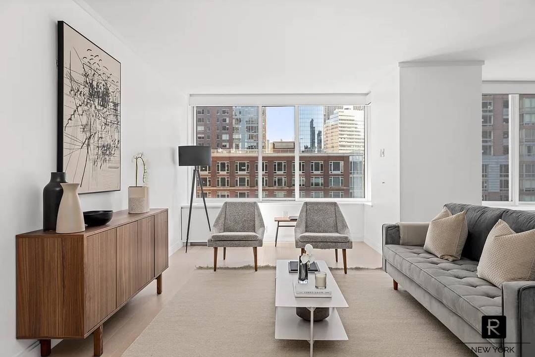 Welcome home to residence 15A at River and Warren.