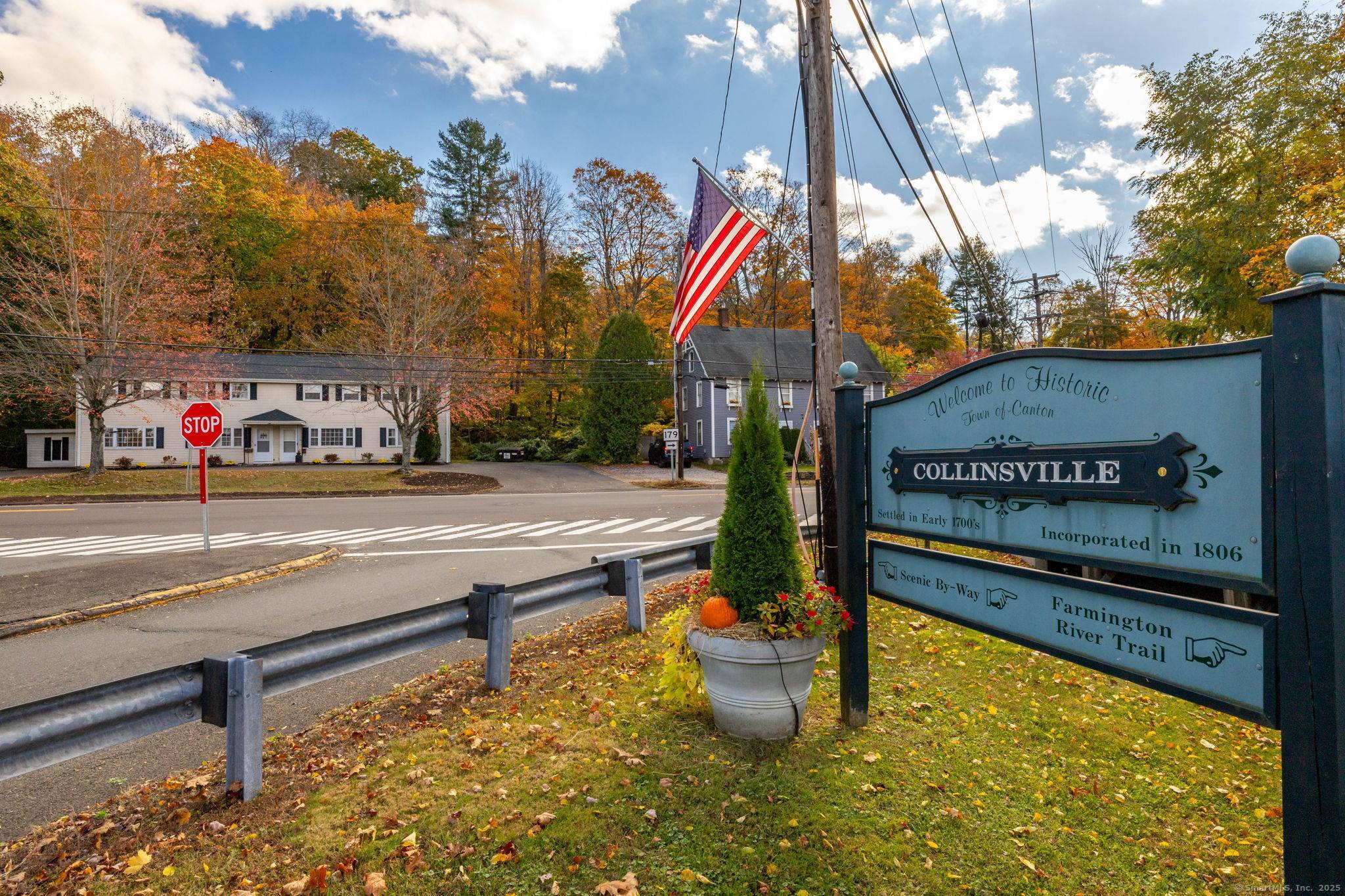 Income Producing Four Family Home with Scenic Farmington River Views in Collinsville.
