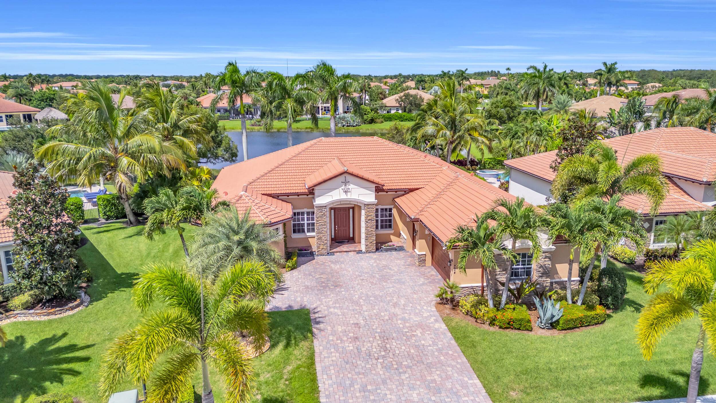 Lakefront Stockton home with stunning pool area.