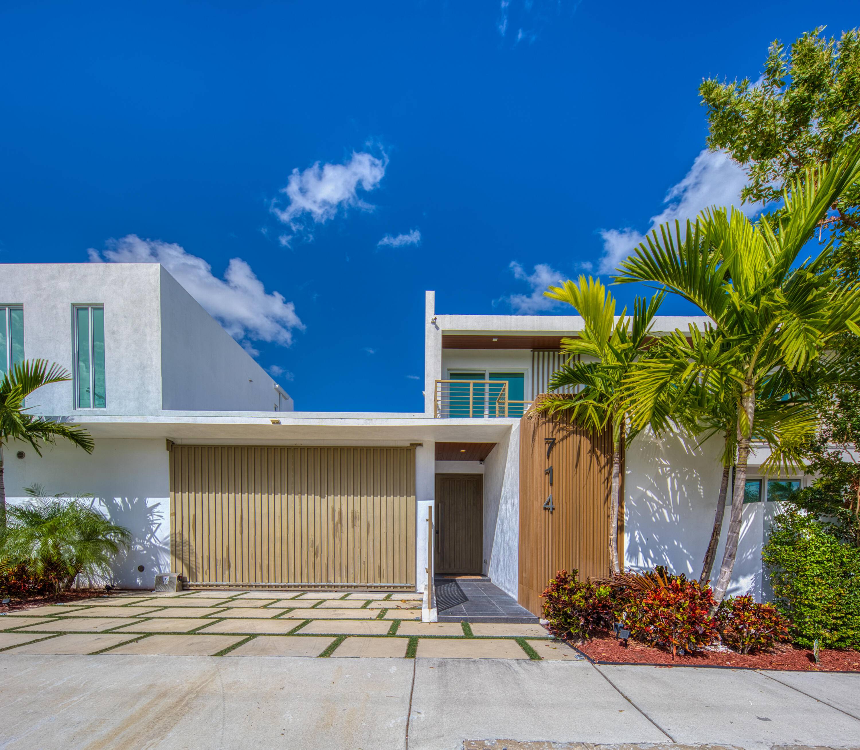 Step into a rare investment opportunity or dream residence with this stunning 2021 built duplex, located near the heart of Downtown Lake Worth Beach.