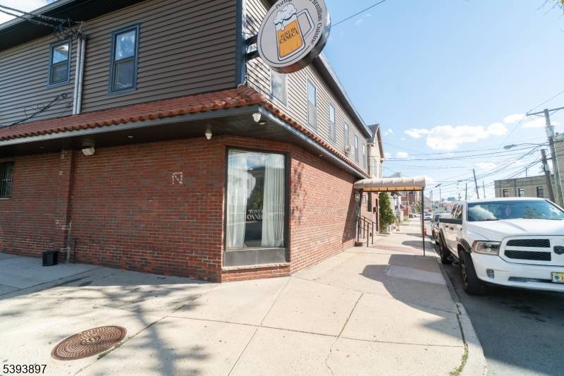 Exceptional Investment Opportunity Fully Renovated Mixed Use Building with Liquor License in North Ironbound !