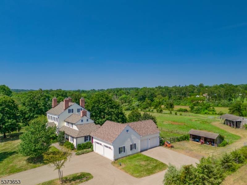 Sited on 8. 5ac in the bucolic Neshanic Station section of Branchburg, this stately farmhouse evokes the charm character of a long ago era while offering all of the modern ...