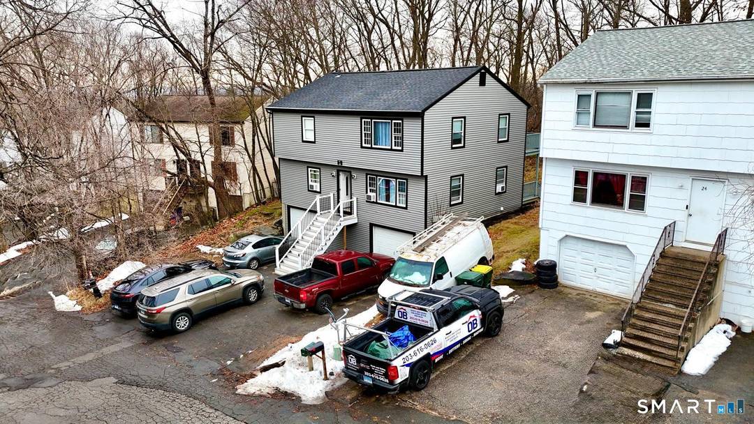 Welcome to 22 Irving Place, Danbury, CT, a well maintained two family home featuring two 3 bedroom apartments, offering flexibility, comfort, and long term value.