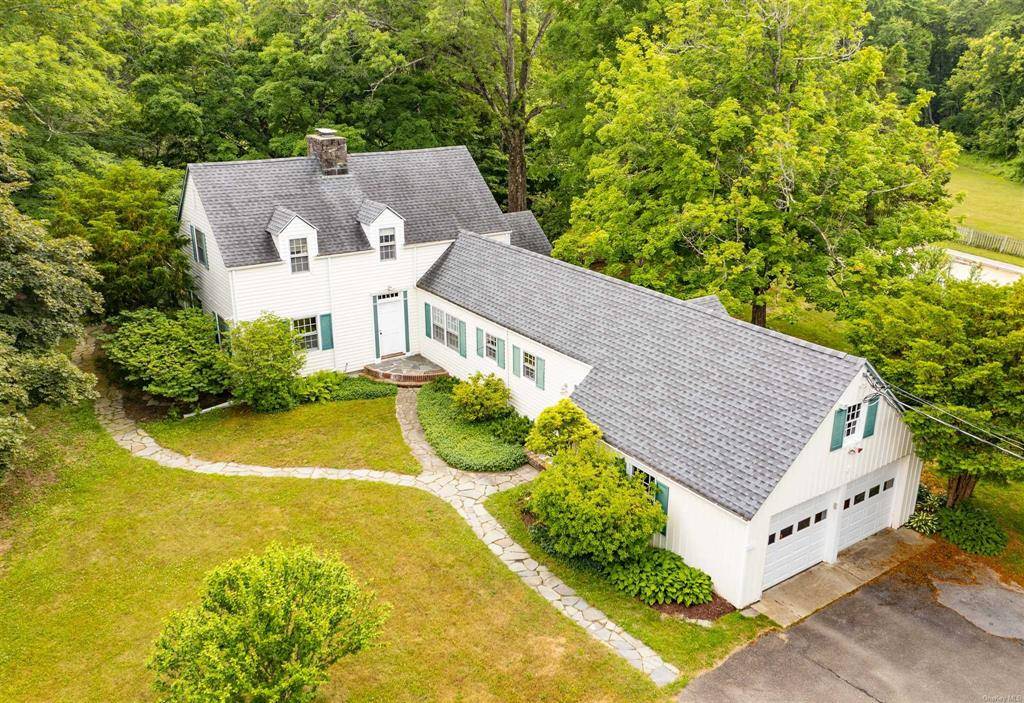 Follow the long driveway to this 1942, 4 bedroom, 3 full bath, beautifully built, Red Hook home sited on 8 acres.