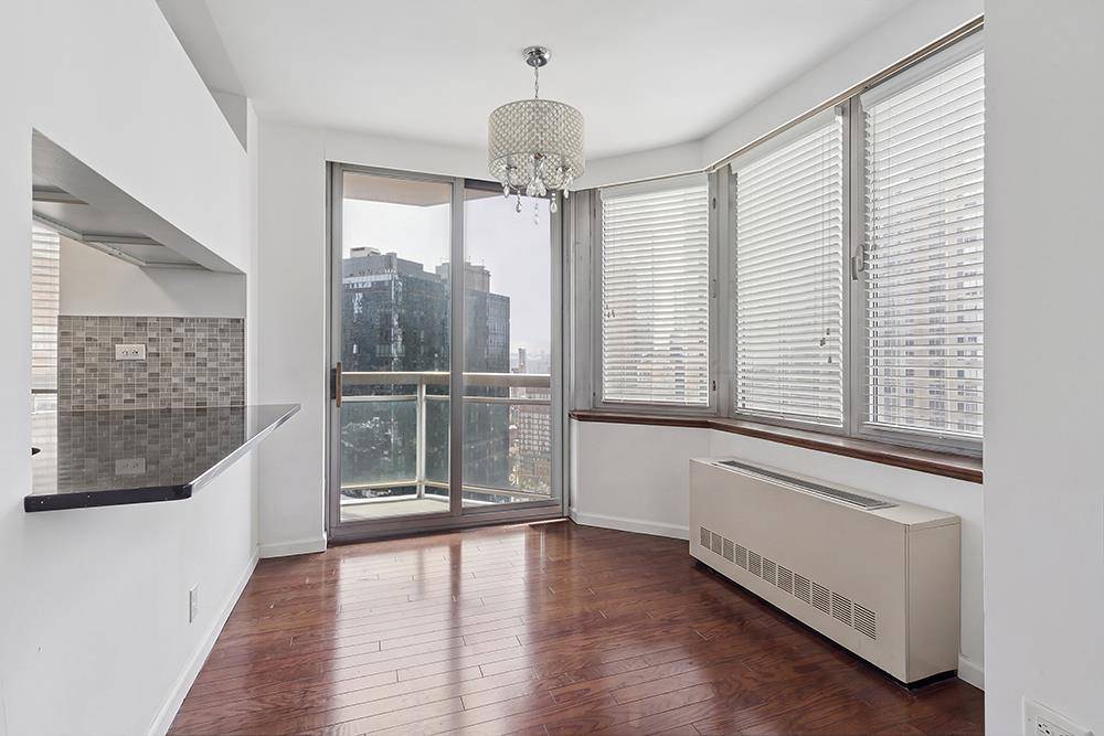 SUNNY WITH GREAT VIEWS ! A great JR 4 with two bath, light filled luxury midtown condo has an exceptional layout.