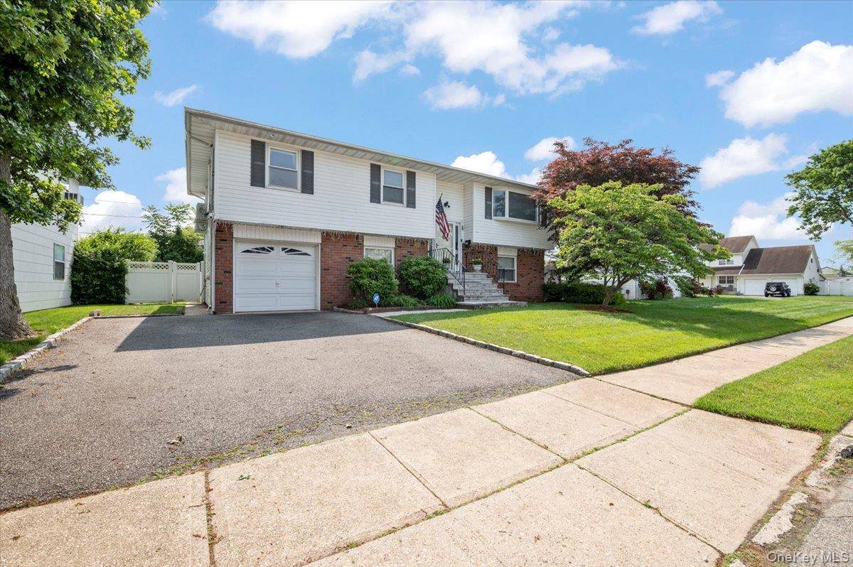 Welcome Home ! Freshly Painted 4 Bed 2 Bath High Ranch in Plainedge Schools, Open Concept Grey amp ; White Kitchen w Island, New Appliances amp ; Porcelain Tile Floors ...