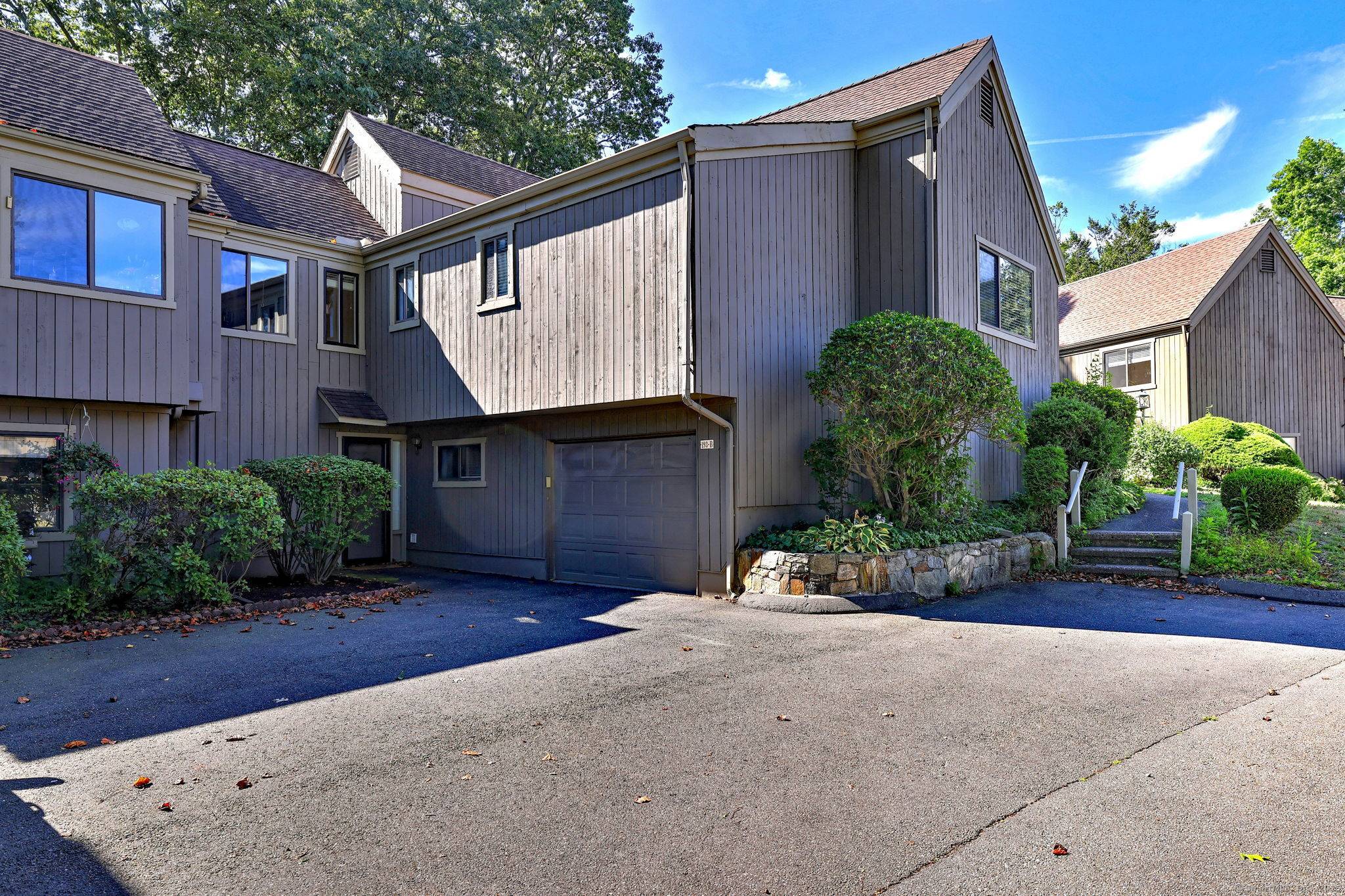 Welcome to the Whittier Unit, the largest model in Oronoque Village, beautifully renovated from top to bottom and perfectly positioned to capture sweeping views of the Blackhawk Golf Course.