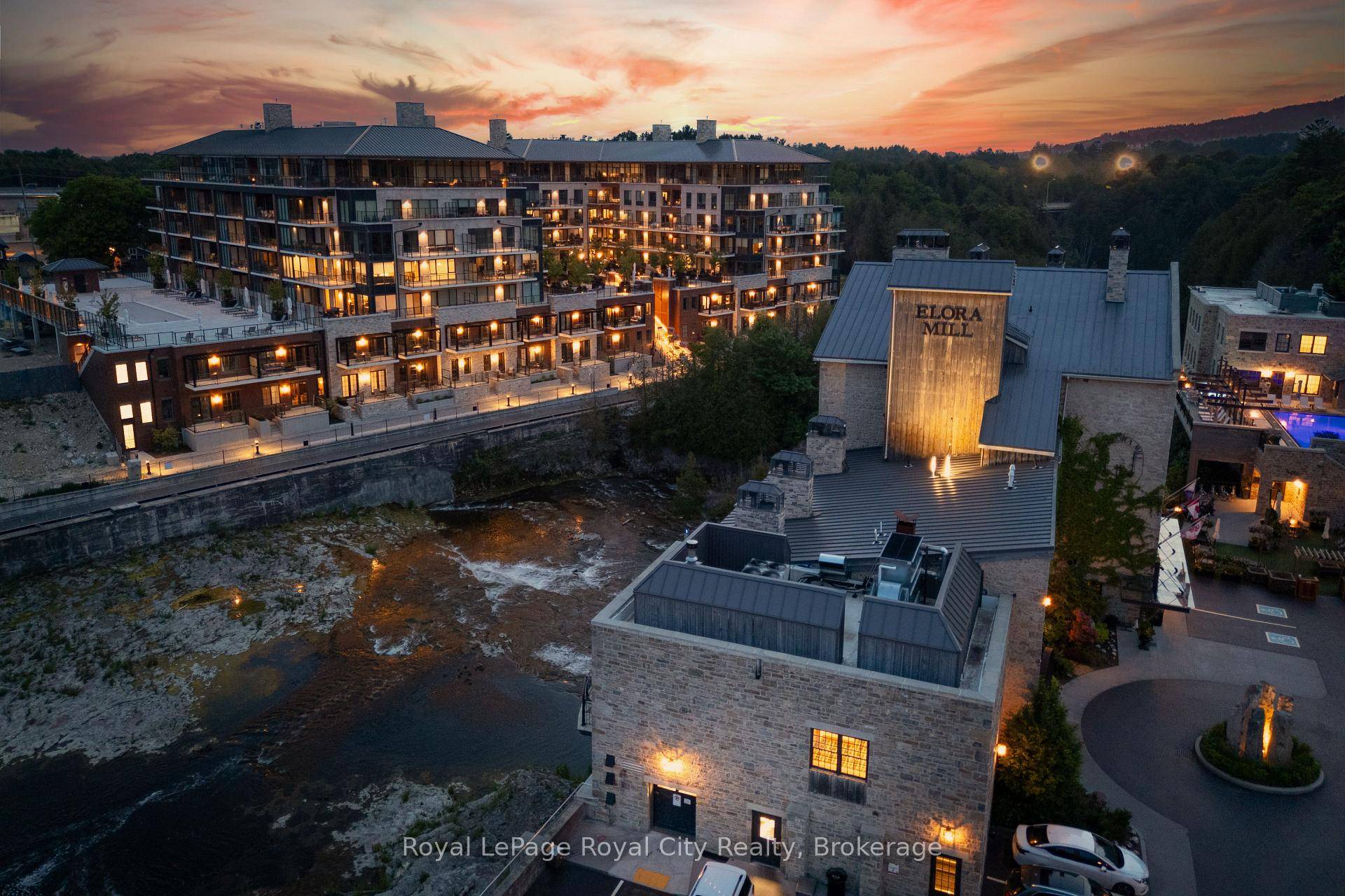 Riverside Condo with Expansive Patio, brimming with riverside sounds and entertaining space.