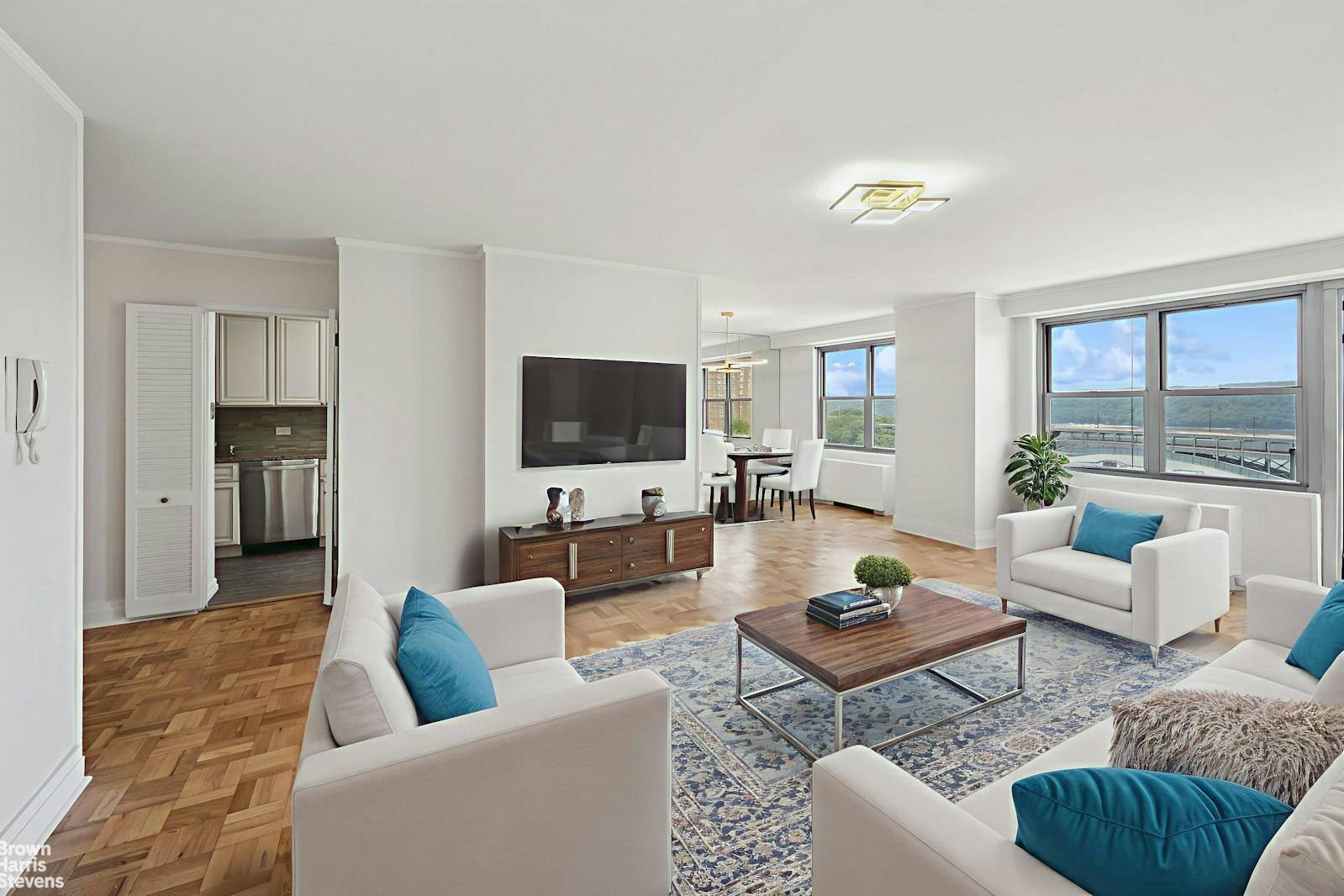 Renovated corner two bedroom, two bath with a terrace and river views at the luxurious Winston Churchill.