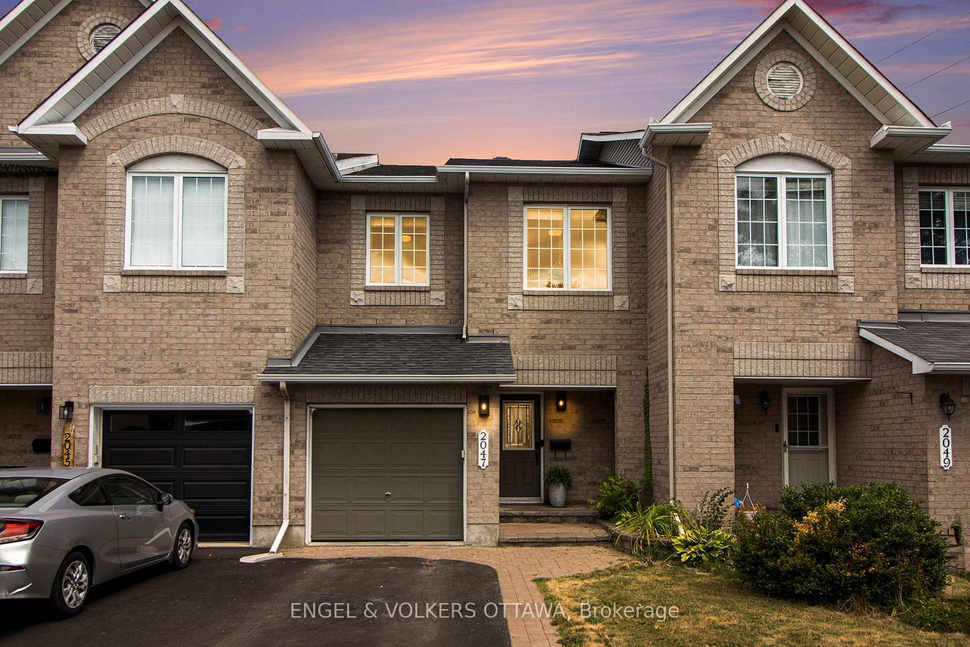 Welcome to 2047 Dorima Street, a beautifully refreshed Minto Empire townhome tucked away on a quiet cul de sac.