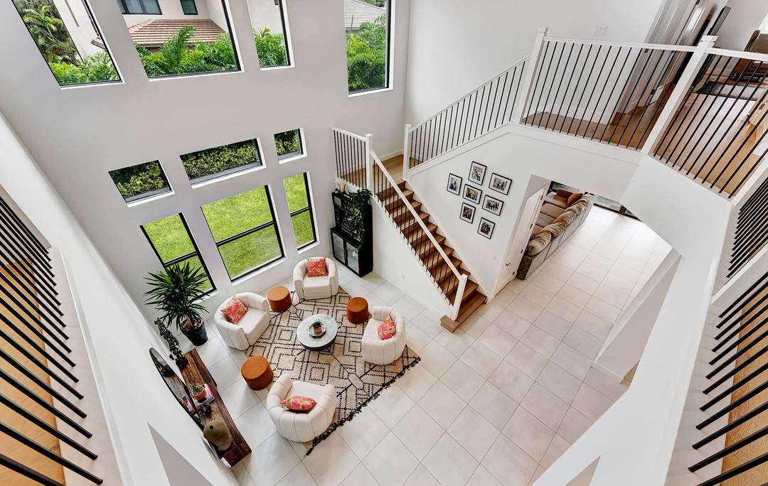 Welcome to this absolutely stunning Polynesian model in the highly sought after Lotus Palm community of West Boca Raton !