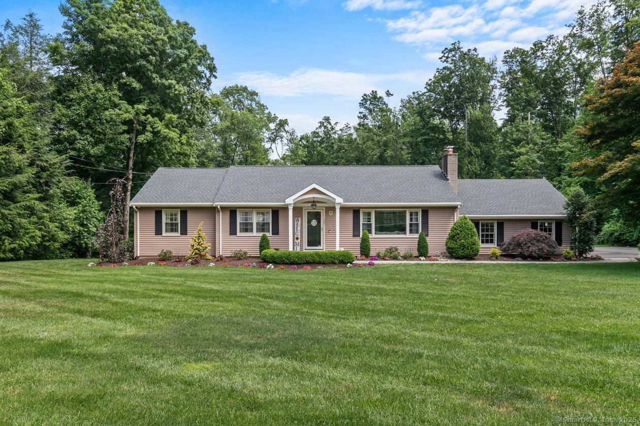 Welcome to West Woods ! This stunning home offers a bright, open floor plan with sun drenched living spaces and gleaming hardwood floors throughout.