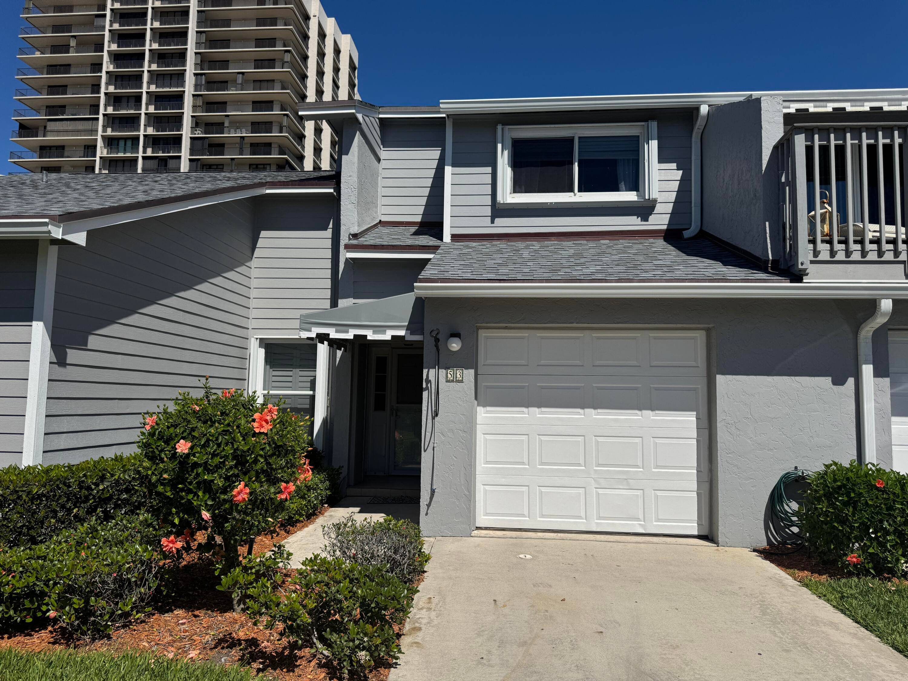 Welcome to the Beach ! Enter this lovely gated community with direct beach access, pool, tennis pickleball, shuffleboard.