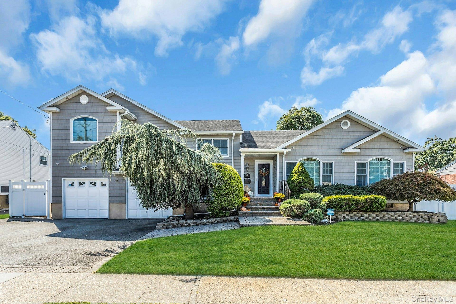 Welcome to this beautifully maintained expanded 5 level split home located in the desirable Massapequa School District.