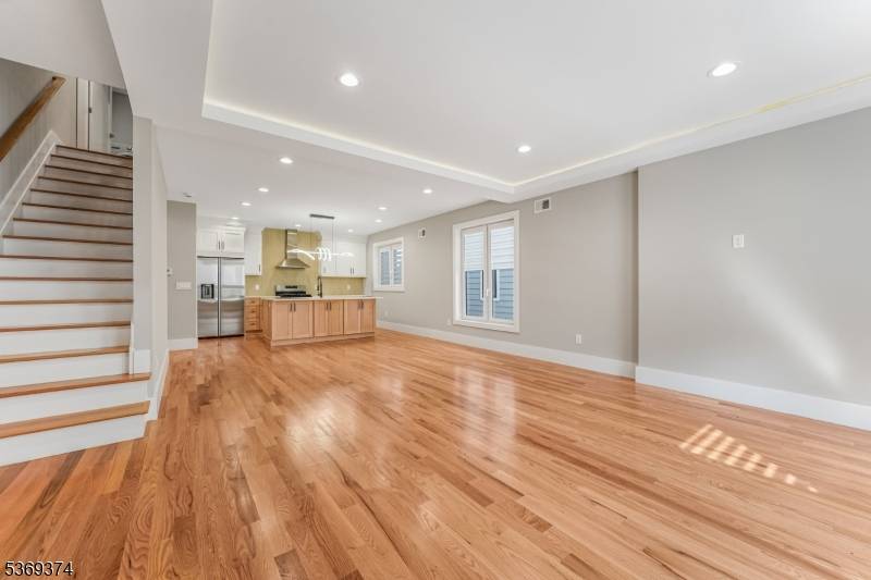 This brand new construction duplex style home provides four floors of luxury living in the heart of downtown Montclair !