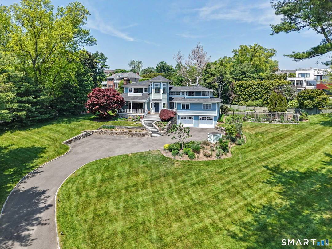 Experience an exceptional coastal lifestyle in the private waterfront enclave of Bluewater Hill in Compo Beach.