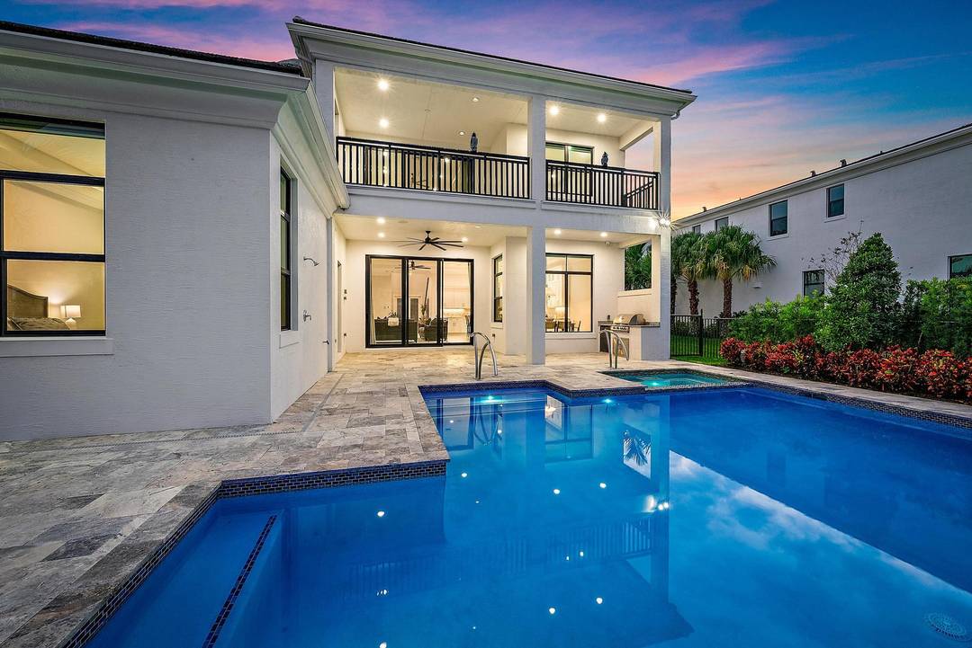 Built in 2023, this exceptional Vasari model is ideally situated on a rare long lakefront homesite, offering some of the most desirable and expansive water views in the community.