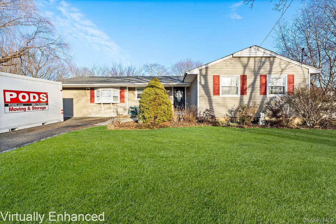 Welcome to 19 Evelyn Rd a beautifully updated ranch style home set on a generous 1 3 acre lot in the heart of Port Jefferson Station.