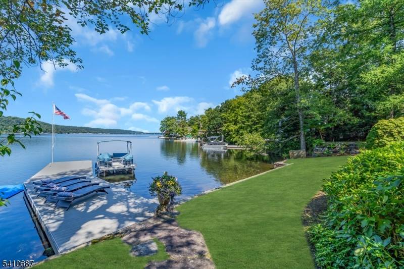 Experience the pinnacle of luxury lakefront living at this exquisite 4 5 bedroom, 4.