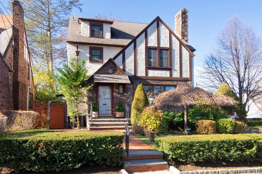 Welcome to this beautifully maintained Tudor style home, perfectly situated on a lovely corner lot in the sought after Lincoln Park neighborhood of Yonkers.